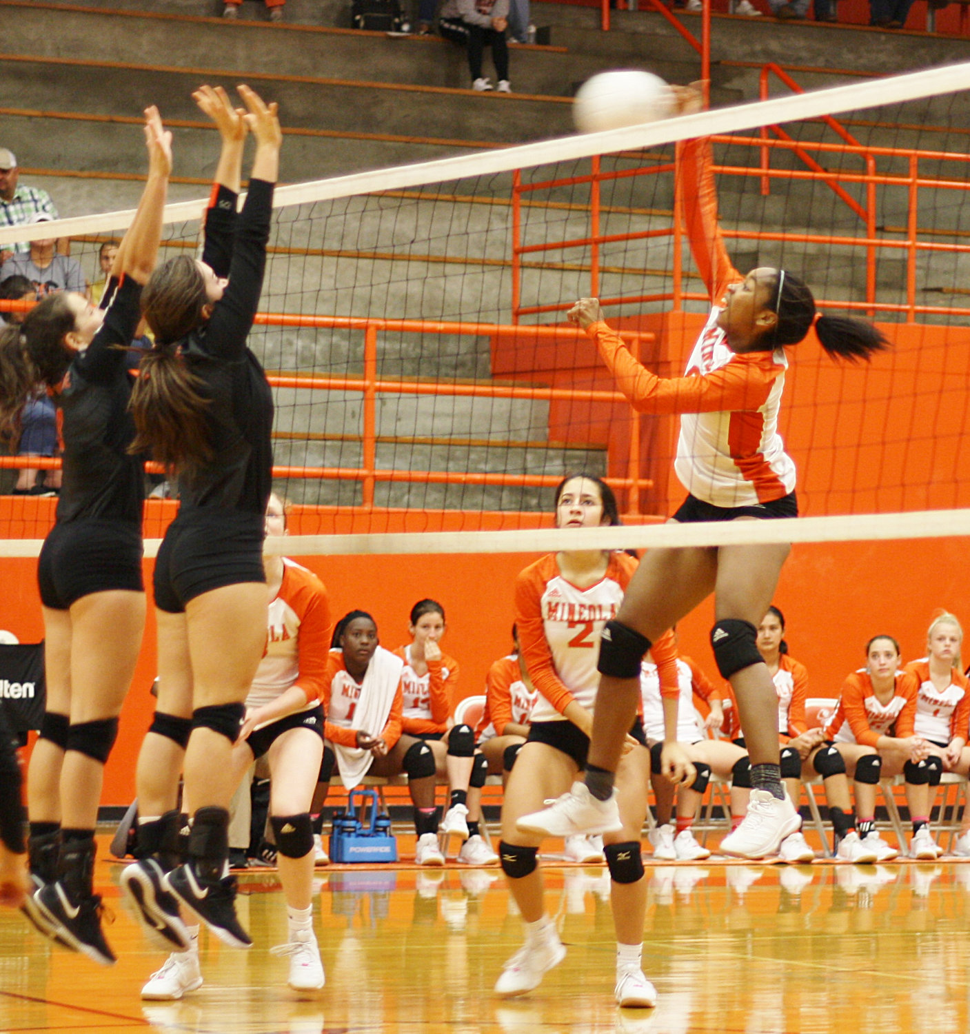 Sabria Dean puts some explosive force on a kill shot in action against the Lady Indians.